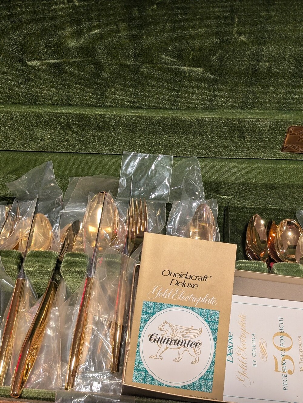 Oneidacraft Deluxe gold electroplated flatware collection in original box